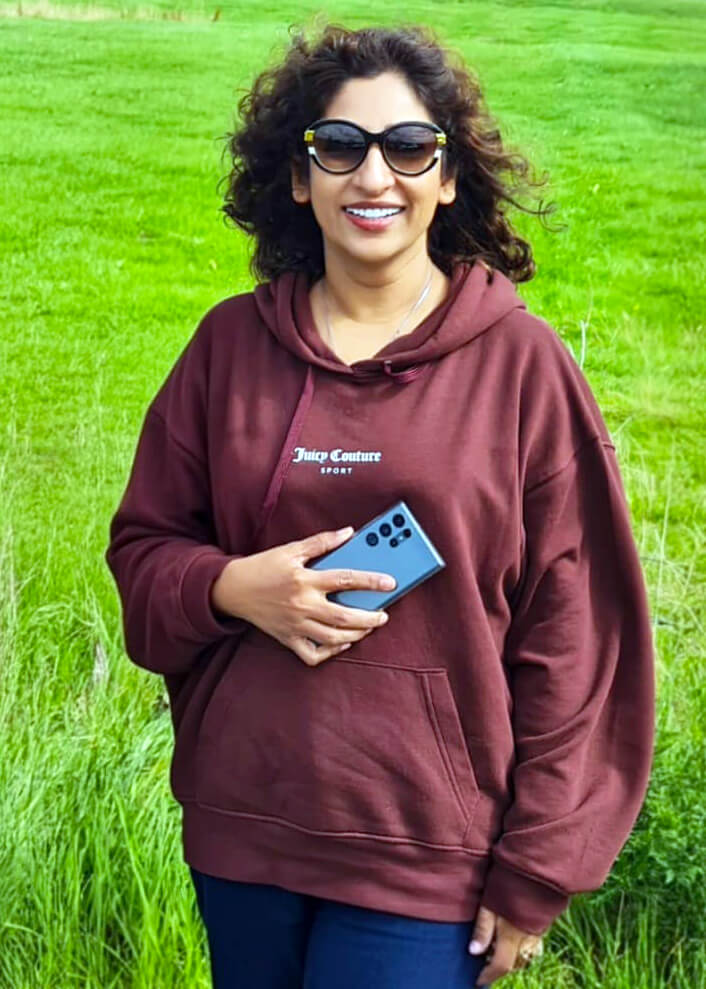 Dr-Lubna-Siddiqui walking in greenery